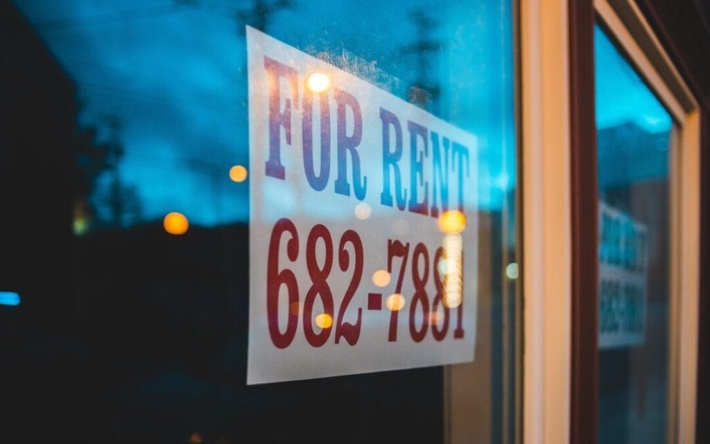 A picture of the Rent poster on the window