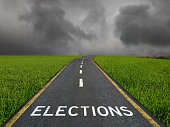 A picture of the word ELECTIONS on the road